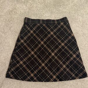 Net international plaid mini skirt